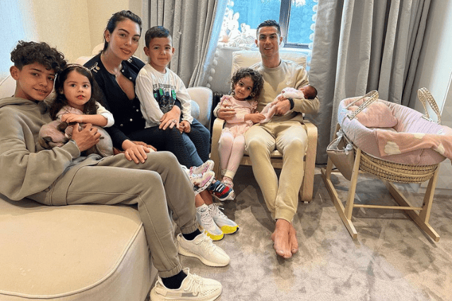 A cherished image captures Cristiano Ronaldo, Georgina Rodriguez, and their adorable children, embodying the joy and love that defines the Ronaldo family. 